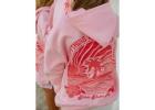 Embrace Bold Style and Comfort with the Pink Palm Puff Hoodie